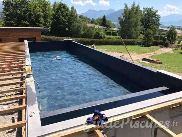 Construction d'une piscine a débordement